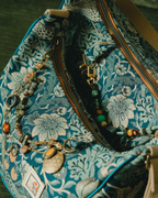 The Storyteller: Crescent Bag